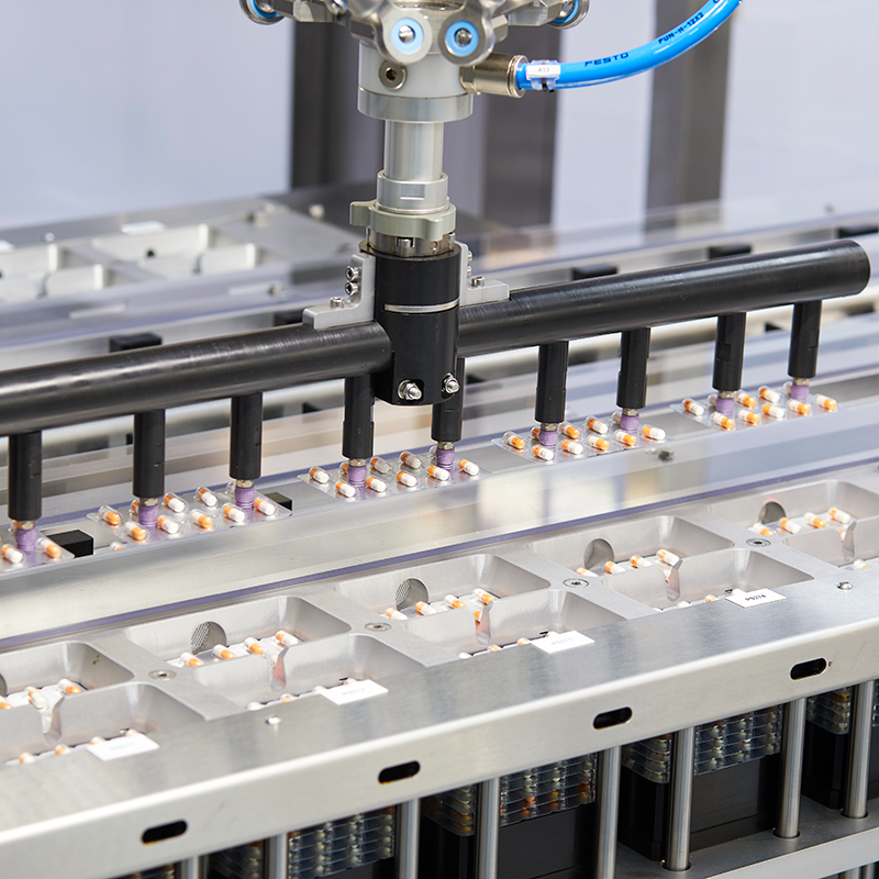 Pick and Place | Blister Receiving, De-Curling, Nesting & Collating System with Cross Transfer To Pillow Machine